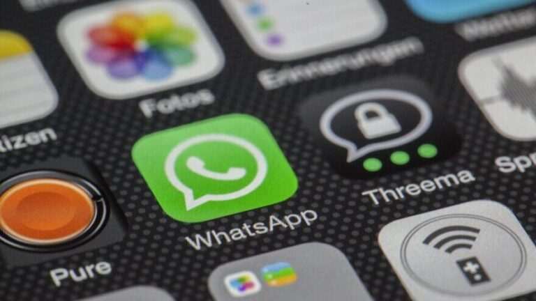 A smartphone screen displaying the WhatsApp app icon, highlighting the applications for interactive language learning